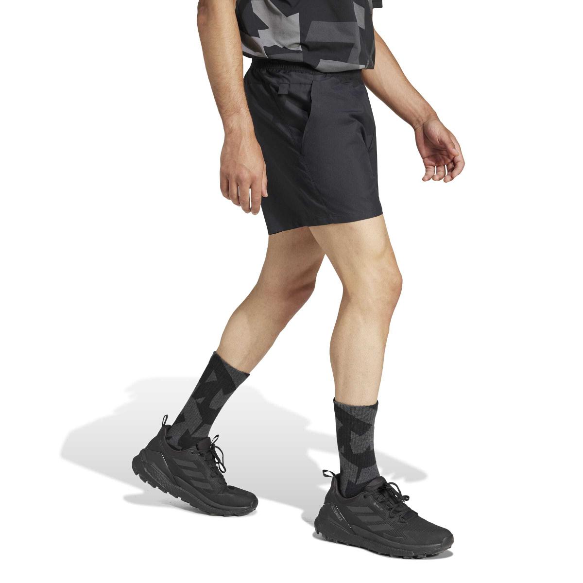 product/2/0/2025_adidas_jf1237_4_apparel_on_model_walking_view_white.jpg