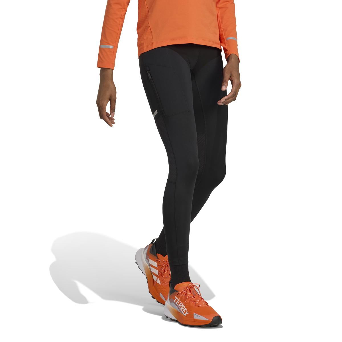 product/2/0/2025_adidas_jm0585_4_apparel_on_model_walking_view_white.jpg