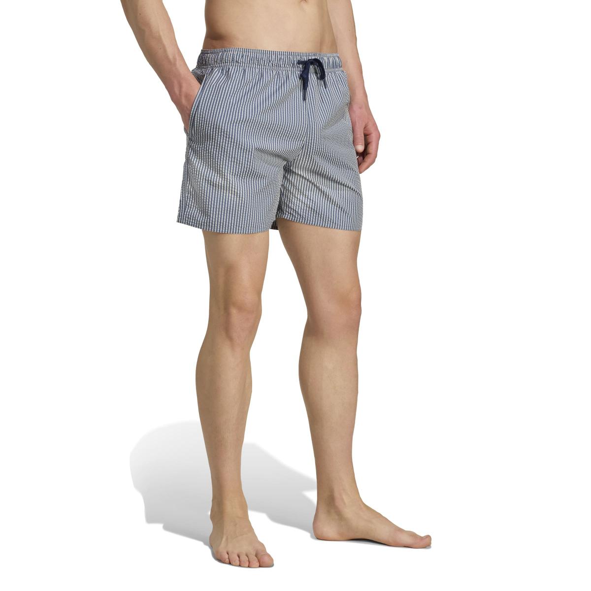 product/a/d/adidas_jx2674_4_apparel_on_model_walking_view_white.jpg