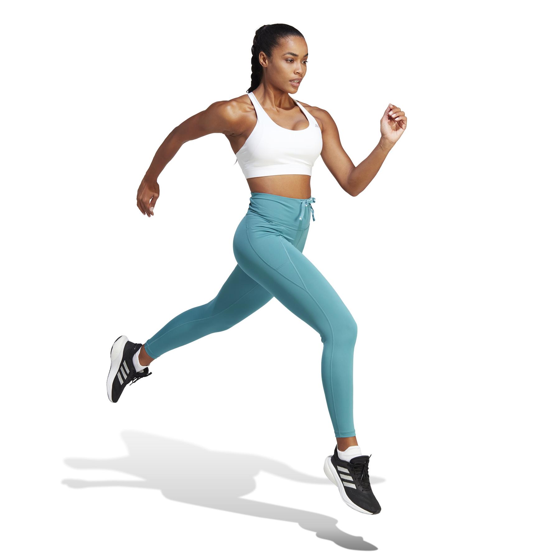 product/2/0/2025_09_adidas_ij6858_5_apparel_on_model_walking_view_white.jpg
