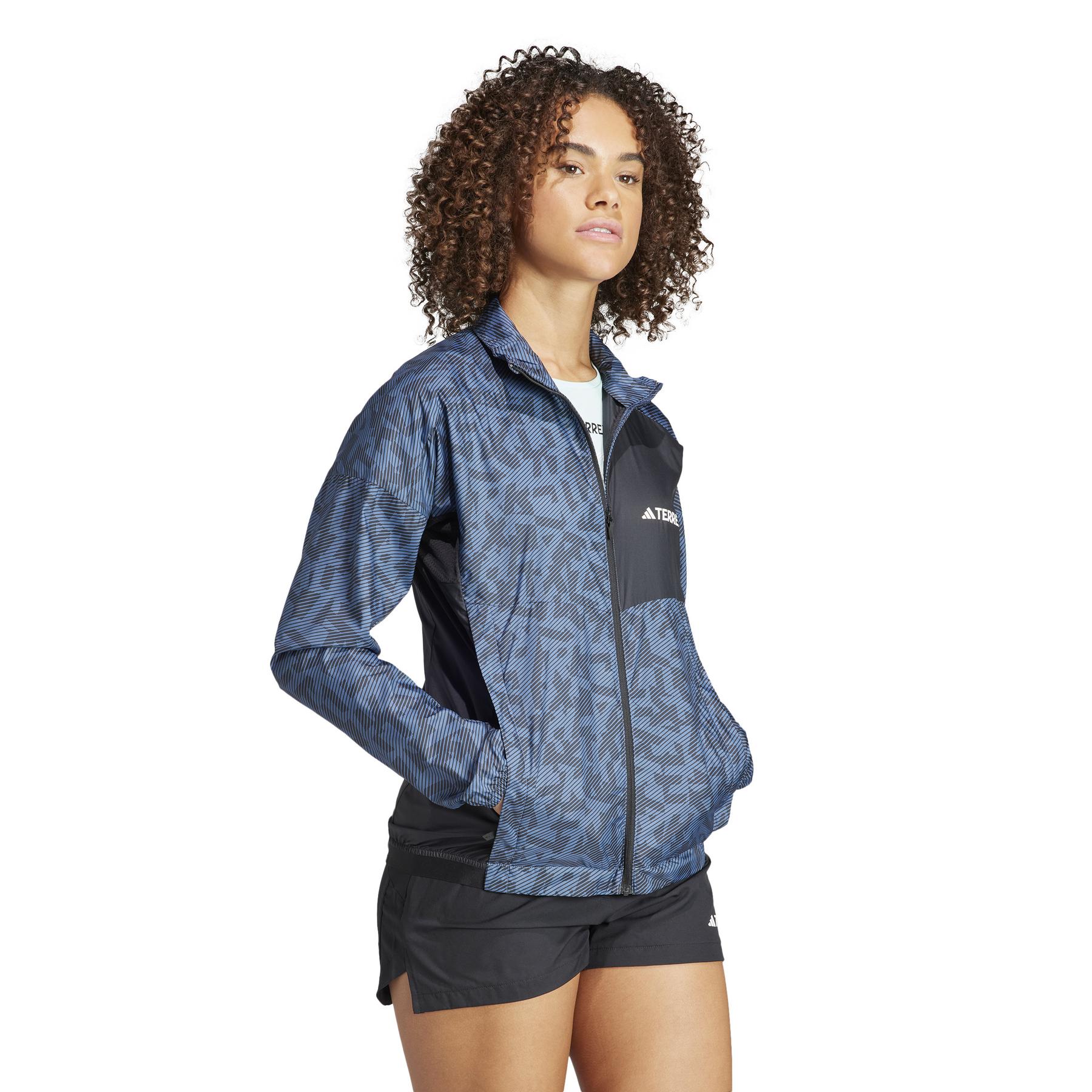 product/a/d/adidas_ia1808_7_apparel_on_model_walking_view_white.jpg