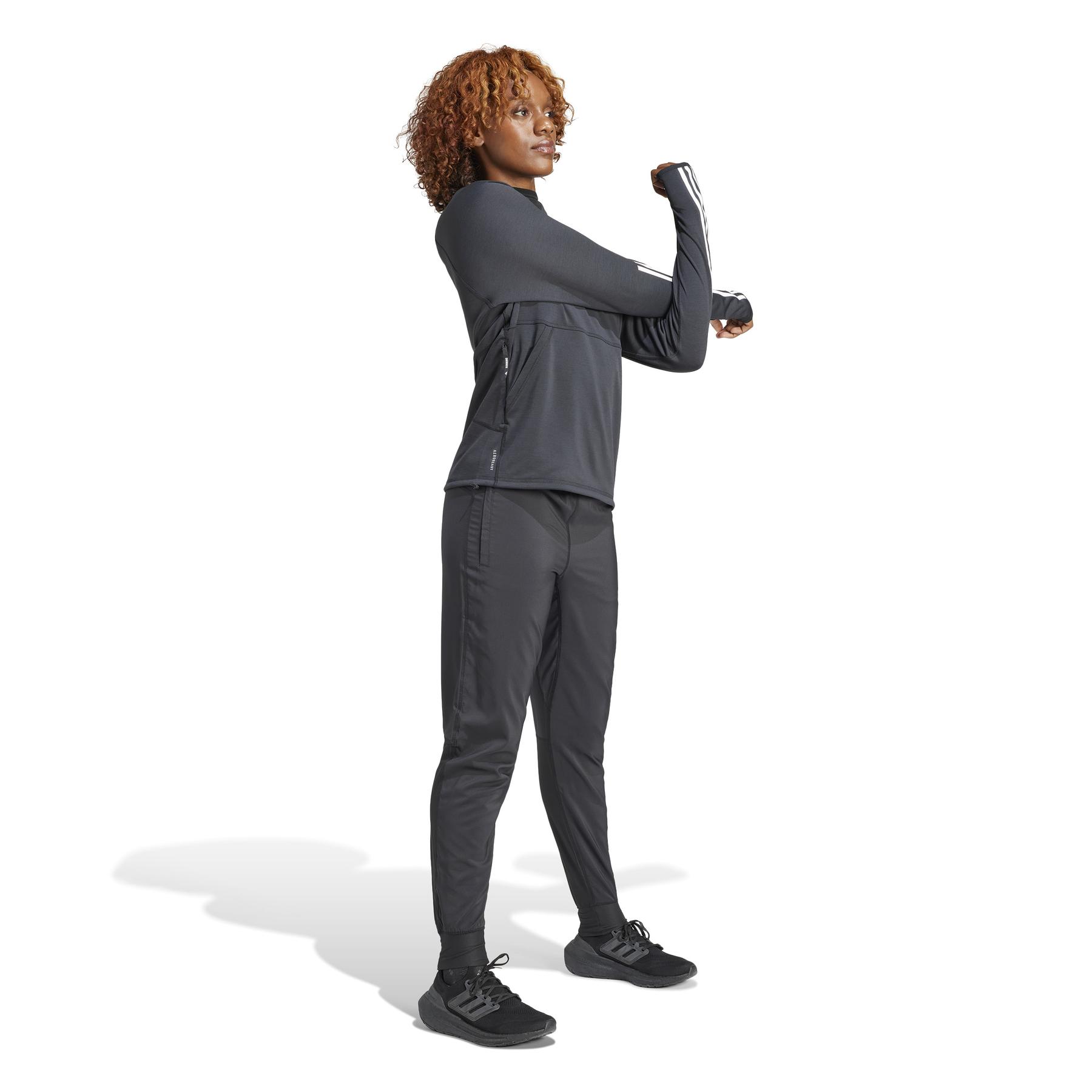 product/a/d/adidas_ik5015_6_apparel_on_model_walking_view_white-nw052224.jpg